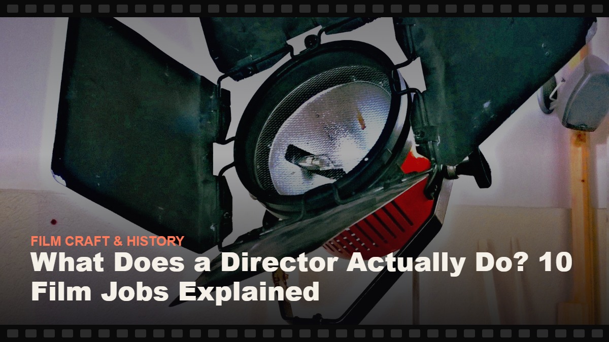 Real photograph of a film set lighting fixture with barn doors on a stand, cover graphic for the Reelmonk guide "What Does a Director Actually Do? 10 Film Jobs Explained"